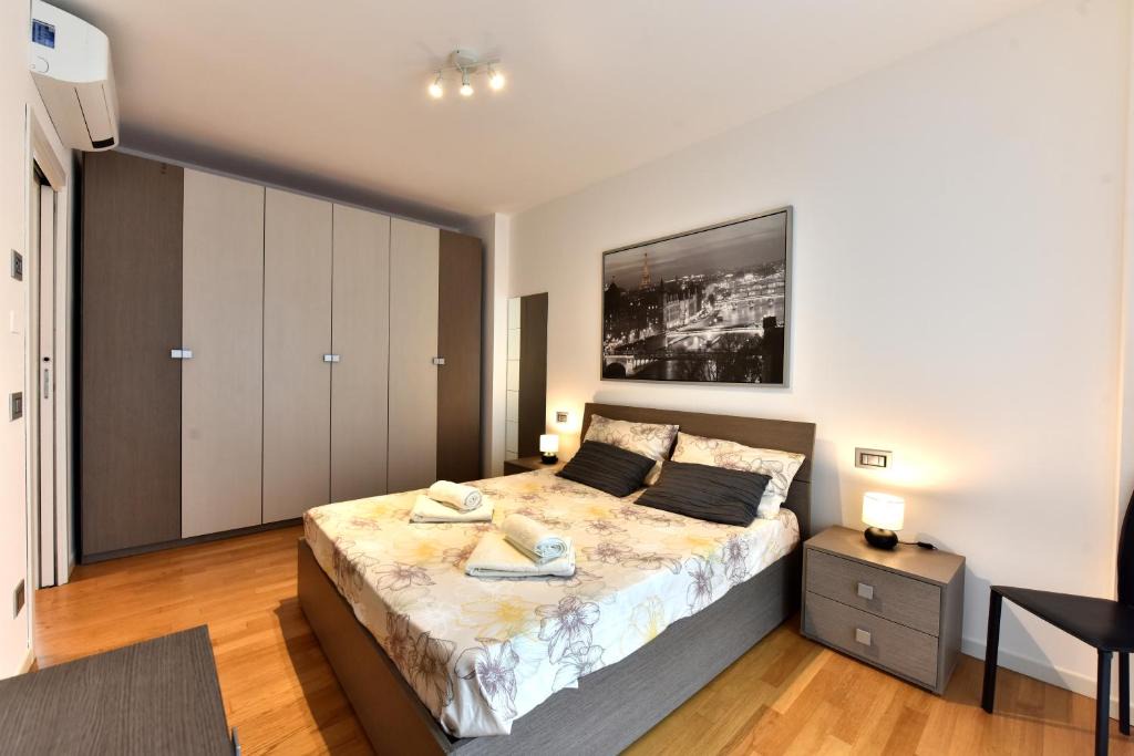 Cernusco sul Naviglio Apartment | CaseOspitali - Casa Kikka, elegante appartamento con balcone in nuovo condominio per 4