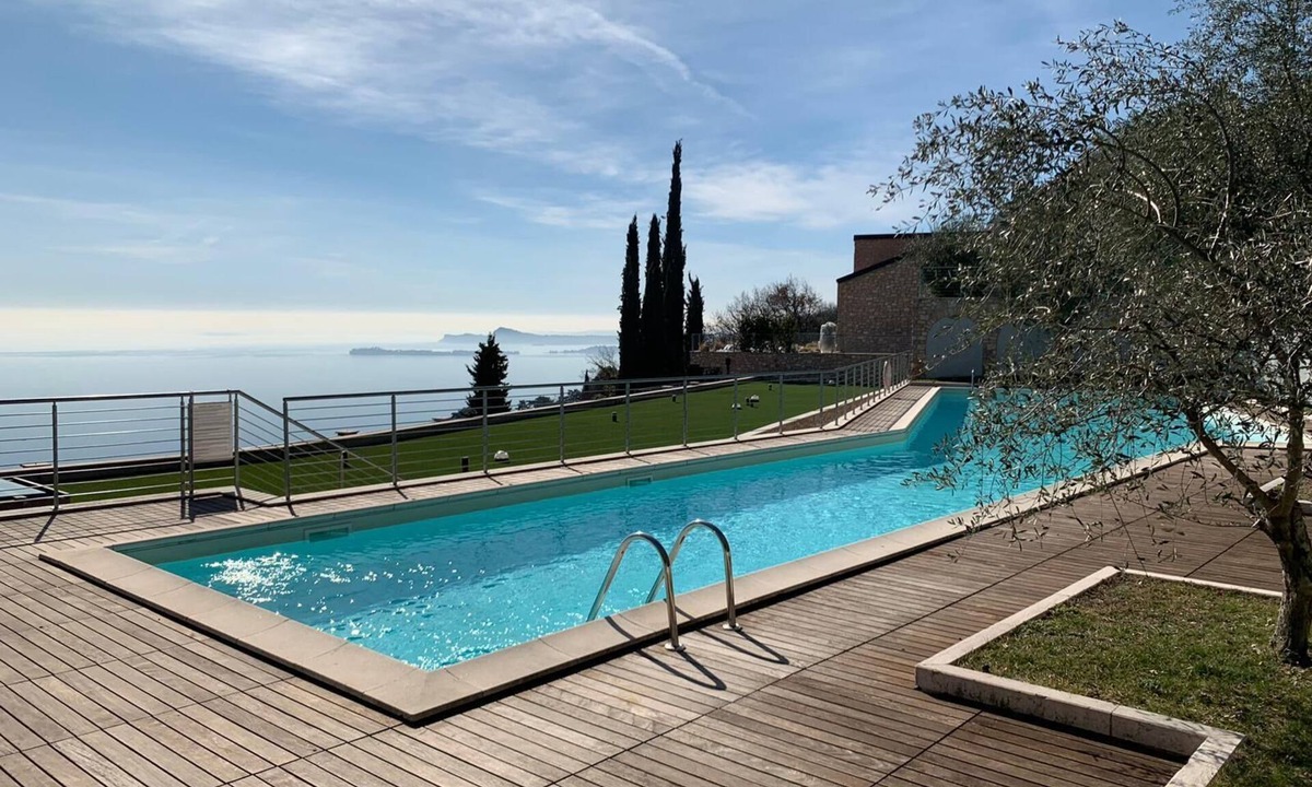 Toscolano Maderno Apartment | Design apartment - 100 sqm green terrace - Pool - Fantastic panoramic lake view