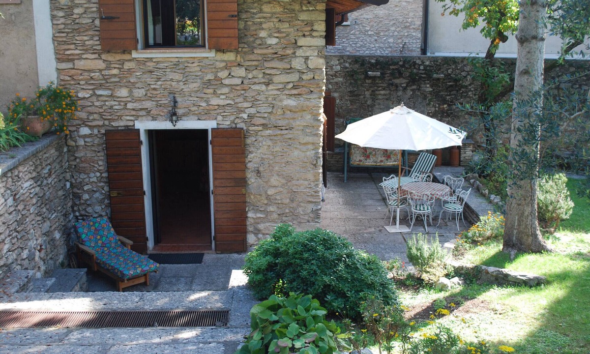 Cecina Apartment | Rustico Cecina by Theater Home, with big closed garden