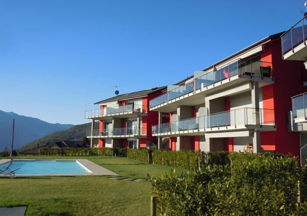 Poppino Apartment | Stylishly furnished apartment in a residence with pool and dream view