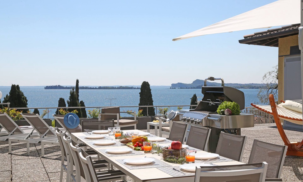 Gardone Riviera Villa | Villa surrounded by greenery with splendid lake view.