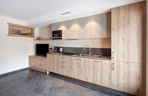Livigno Apartment | Apartment 'Rasia Residence Relax' with Mountain View, Shared Garden and Wi-Fi