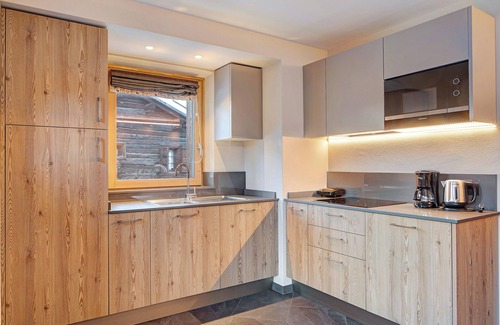 Livigno Apartment | Apartment 'Rasia Residence Relax' with Mountain View, Shared Garden and Wi-Fi