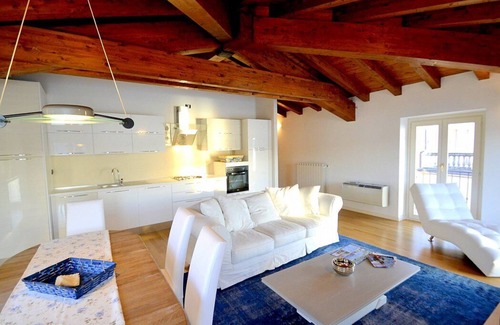 Salo House | Casa Nuvola: A bright and elegant apartment located on the lake promenade of Lake Garda.