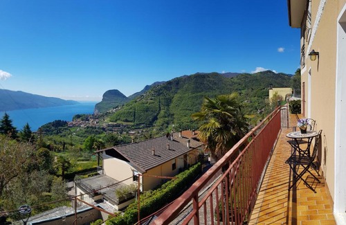 Voltino Apartment | Casa Palanca 2 balcony lake view By Garda Domus Mea