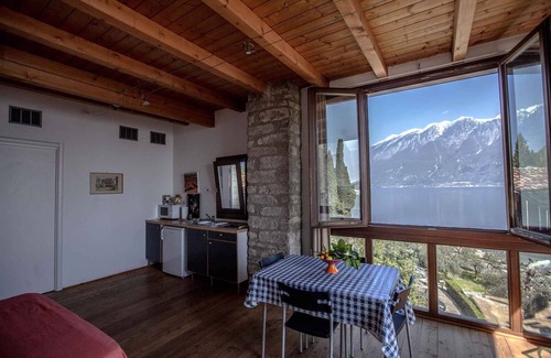 Tignale Apartment | Studio rustically furnished, overlooking lake and with terrace