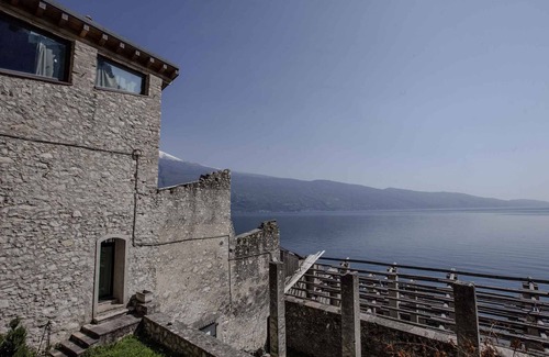 Tignale Apartment | Studio rustically furnished, overlooking lake and with terrace