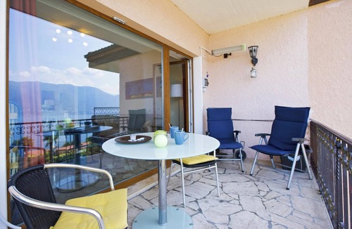 Villaggio Belmonte Apartment | 1½ room apartment with balcony and breathtaking lake view in a residence with pool