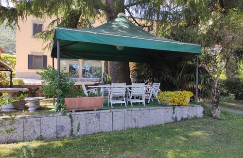 Tavernola Apartment | 80sm fully-equipped apartment on lakeside with garden, gazebo and private parking