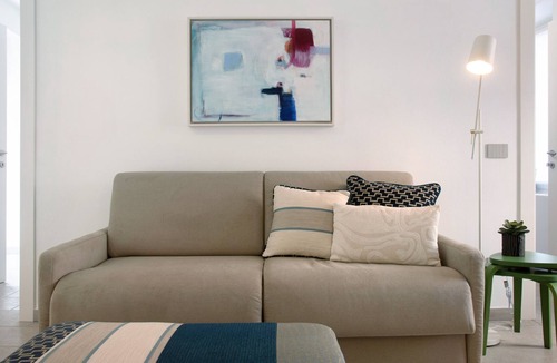 Lavena Ponte Tresa Apartment | Apartment 'Atelier Milvia 1' with Private Terrace, Private Garden and Wi-Fi