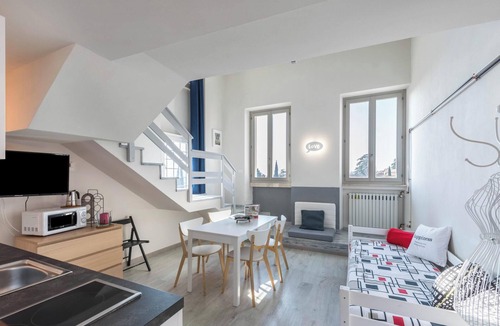 Toscolano Maderno Apartment | Apartment Garda Friends Mondrian with Lake Views, Garden & Wi-Fi