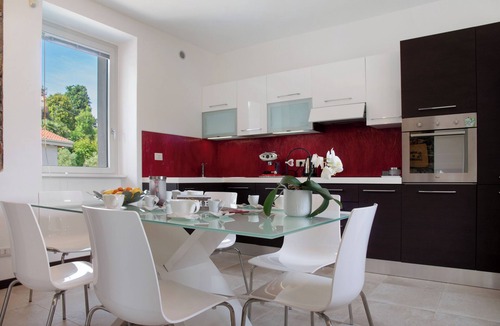 Laveno Apartment | Apartment 'La Fonte Primo Piano' with Mountain View, Shared Garden and Wi-Fi