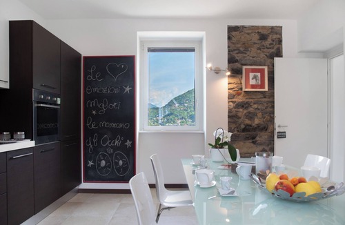 Laveno Apartment | Apartment 'La Fonte Primo Piano' with Mountain View, Shared Garden and Wi-Fi