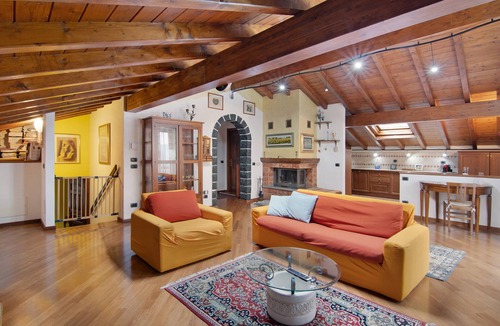 Lanzo d'Intelvi Apartment | Apartment "La Mansarda di Eros e Tiziana" with Mountain View, Shared Garden & Wi-Fi