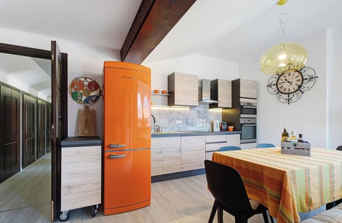 Germignaga Apartment | Apartment 'Mansarda Vialba' in Holiday Home with Lake View and Balconies