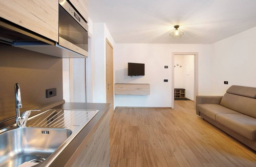 Livigno Apartment | Apartment 'Palipert Nature House' with Mountain View, Shared Garden and Wi-Fi