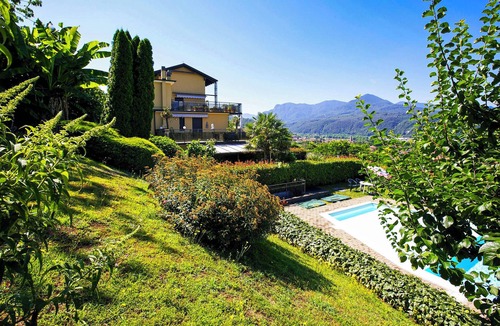 Luino Apartment | Apartment with large terrace and garden in a residence with pool