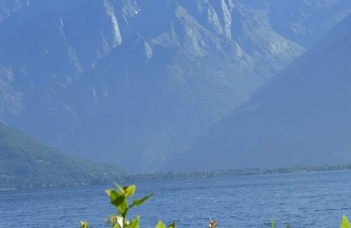 Musso Apartment | Apartment with pool, private garden & private boat mooring at shore lake Como