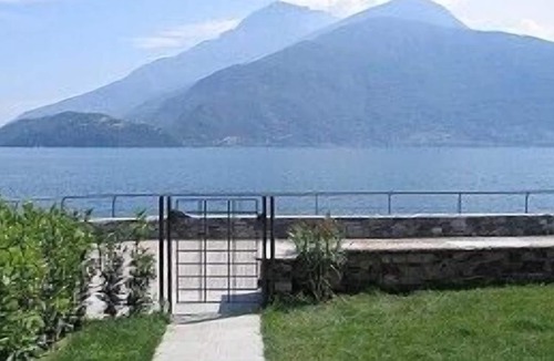 Musso Apartment | Apartment with pool, private garden & private boat mooring at shore lake Como