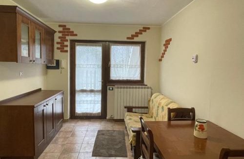 Torre di Santa Maria Apartment | Appartamento con Giardino e Box in Valmalenco