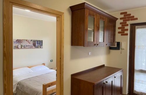 Torre di Santa Maria Apartment | Appartamento con Giardino e Box in Valmalenco