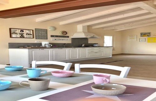 Ponti sul Mincio Apartment | Attic lake view immersed in the Morenic hills
