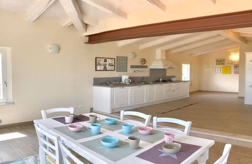 Ponti sul Mincio Apartment | Attic lake view immersed in the Morenic hills