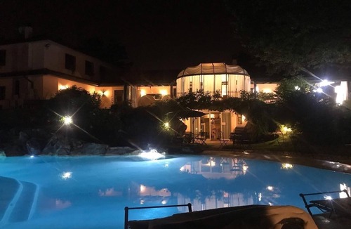 Arcore Apartment | Buen Retiro. An partment in a private villa with park, tennis and swimming pool