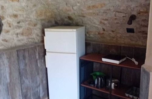 Bene Lario RV Rental | Caravan 'Glamping C Selva Tenda Ciliegio' with Mountain View and Shared Garden