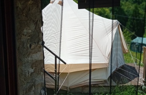 Bene Lario RV Rental | Caravan 'Glamping C Selva Tenda Ciliegio' with Mountain View and Shared Garden