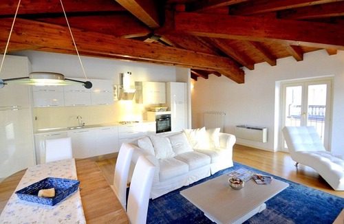 Salo House | Casa Nuvola: A bright and elegant apartment located on the lake promenade of Lake Garda.