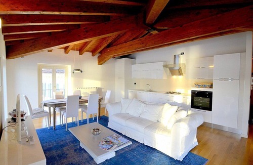 Salo House | Casa Nuvola: A bright and elegant apartment located on the lake promenade of Lake Garda.