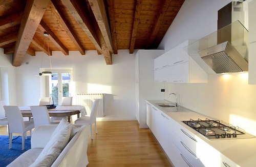 Salo House | Casa Nuvola: A bright and elegant apartment located on the lake promenade of Lake Garda.