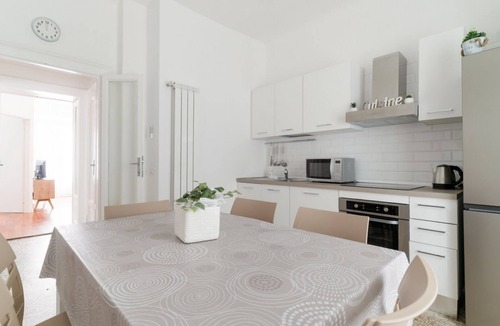 Tricolore Apartment | Charming 105 sqm apartment, accommodating up to 5 people, located on the first floor of a building with an elevator (NOT wheelchair accessible).The property is located in the Risorgimento district, a well-served residential area just steps from Milan's c