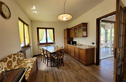 Costa Volpino Villa | Domus Bianca Single villa surrounded by greenery with a wide view of Lake Iseo
