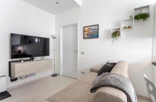 Dergano Apartment | Duomo a 15 minuti di Metro-Suite con Netflix ad Affori M3