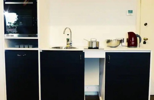 Carrobbio Apartment | Elegant loft with cathedral terrace and park view