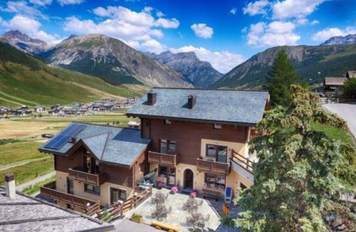 Teola Apartment | Flat Fopel - Baita Cusini with mountain views, wellness area and Wi-Fi