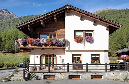 Livigno Apartment | Holiday Apartment 'Stelle Chalet Martina' Near Ski Slopes with Garden & Wi-Fi
