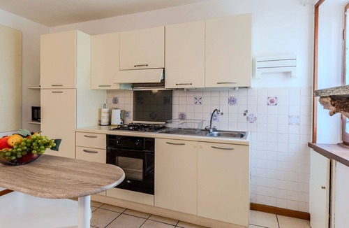Claino Con Osteno Apartment | Lovely apartment for 4 guests with WIFI, TV, pets allowed and parking