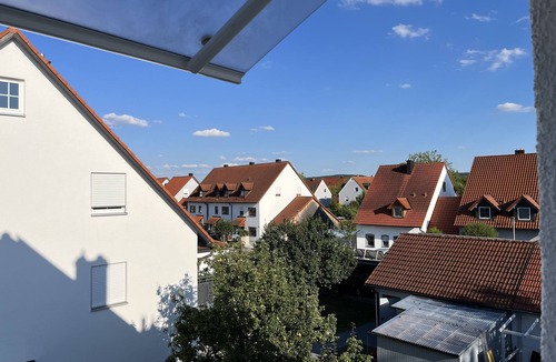 Dingolfing Apartment | Modern apartment with separate home office & pellet stove