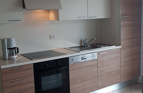 Manerba del Garda Apartment | Montecolo Resort three-room apartment with splendid lake view, swimming pool