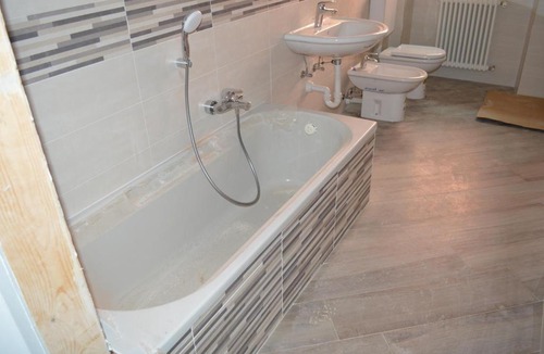 Tirano Apartment | Parravicini Red Flower apartment