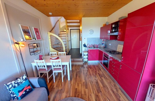 Villanuova sul Clisi Villa | Red villa with shared pool and private garden is the new black on Lake Garda