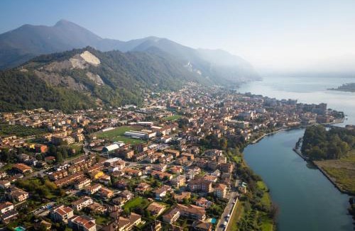 Sarnico Apartment | Rifugio Elegante a due passi dal Lago - Free Wifi Giardino e AC