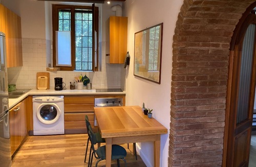 Porta Genova Apartment | Secret Garden on Water in the City Center.