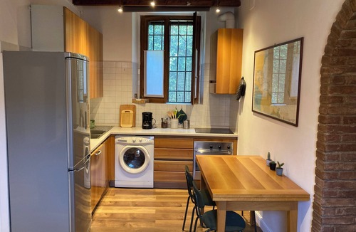 Porta Genova Apartment | Secret Garden on Water in the City Center.