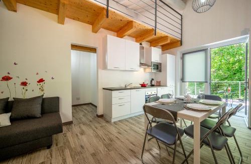 Montemezzo Apartment | Tenuta il Sogno Ferienwohnung Bianco