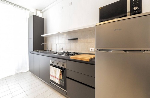 Chinatown Apartment | The apartment is located on the third floor of a building without a lift.It comfortably accommodates 4 people in 60 mqs, with a double bed, two single beds and a sofa bed in the living room.The accommodation is strategically located, a 5-minute walk fro