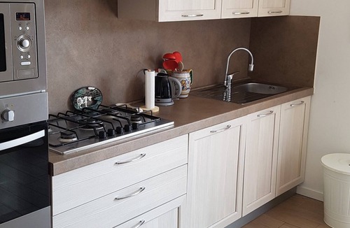 Tavernola Bergamasca Apartment | Vacation apartment with wonderful panoramic lake view, 2 terraces, pool, parking lot
